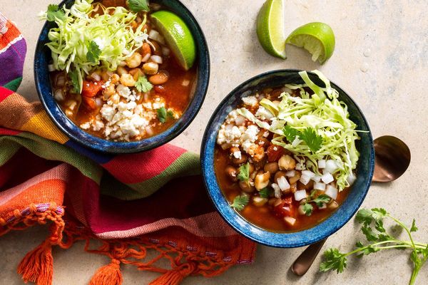 Easy pinto bean and hominy pozole rojo with queso fresco