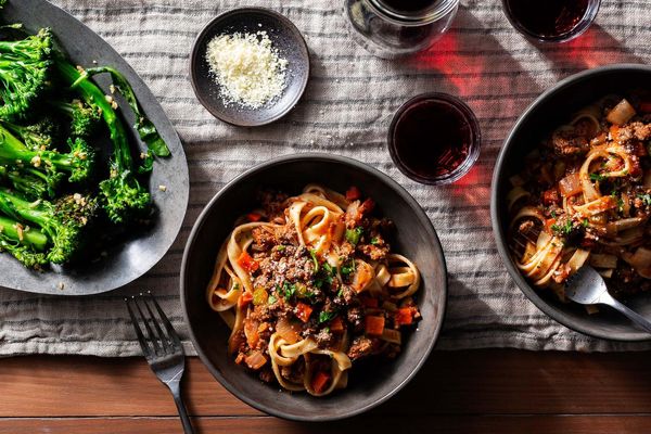 Fresh fettuccine Bolognese and garlicky baby broccoli