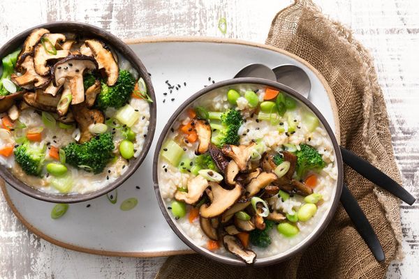 Brown rice congee with edamame, mushrooms, and ginger
