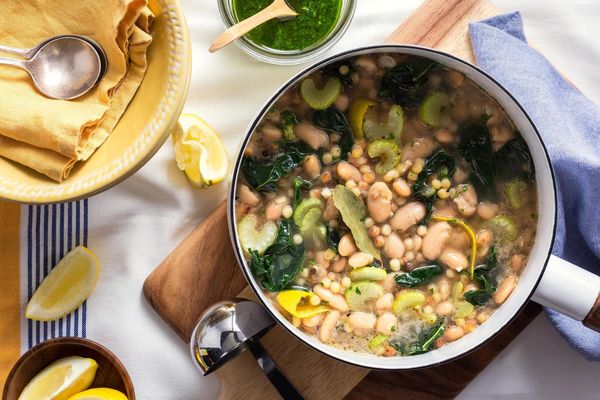 Butter beans and fregola en brodo with kale and pistou