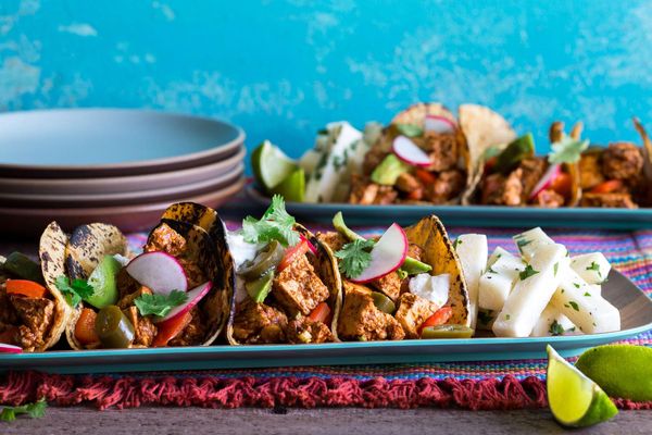 Tofu mole tacos with avocado and jicama sticks