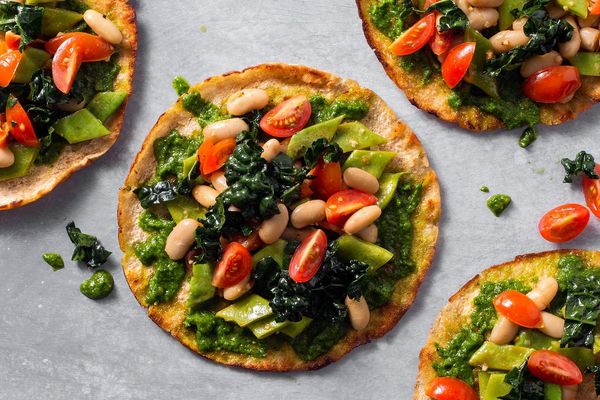 Mediterranean two-bean pitas with tomatoes and basil pesto