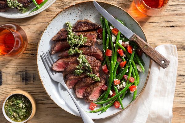 Steaks with arugula salsa verde and green bean–feta salad