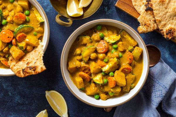 Golden potato curry with squash and whole grain naan