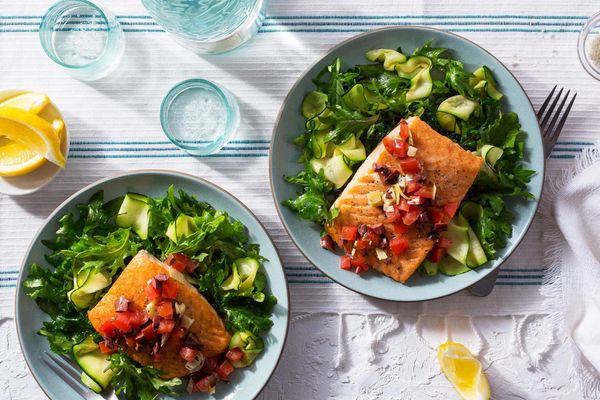 Greek salmon over zucchini noodles and wilted greens