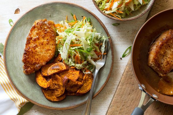 Orange chipotle–glazed pork with coleslaw and roasted sweet potato