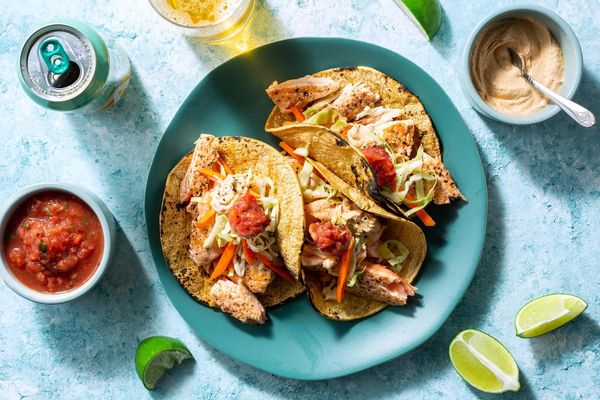 Salmon tacos with cabbage slaw, salsa roja, and chipotle yogurt