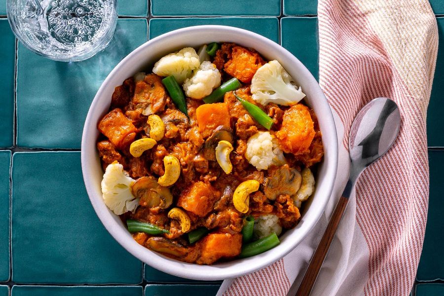 Chipotle butternut squash stew with chorizo, cauliflower, and cashews