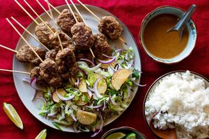 Korean beef skewers with bok choy–plum slaw