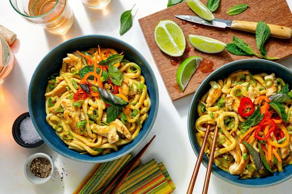 Pork cashew curry with udon and fresh herb salad
