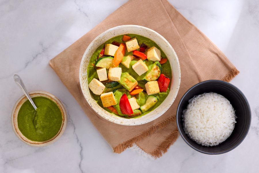 Spicy Thai green curry with jasmine rice, zucchini, and bell pepper