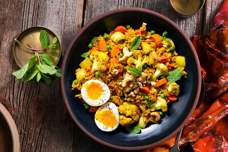 Mughlai vegetable biryani with brown rice and soft-cooked eggs