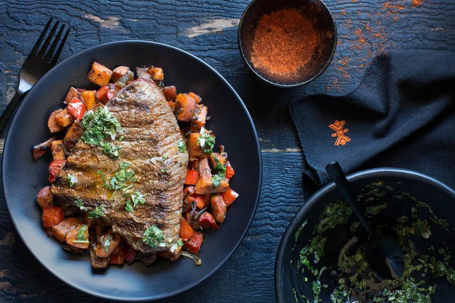 Steaks with sweet potato hash browns and chimichurri