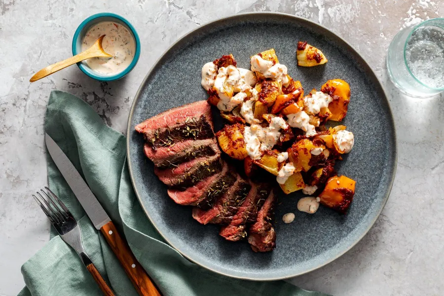 Spanish steaks with patatas bravas and bell pepper alioli