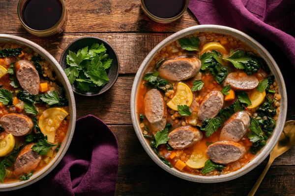 Mediterranean sausage and lentil stew with squash and wilted kale