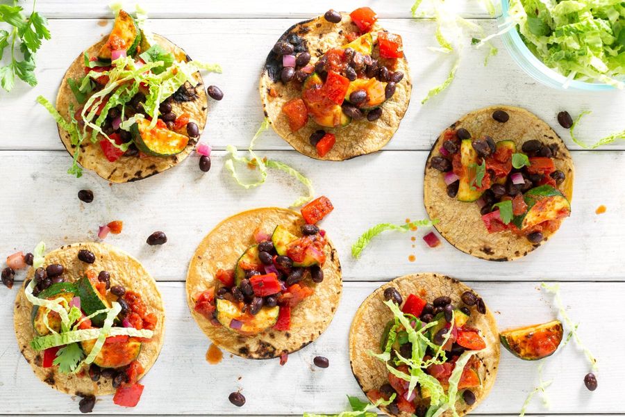 Zucchini and black bean tacos with cabbage–bell pepper slaw