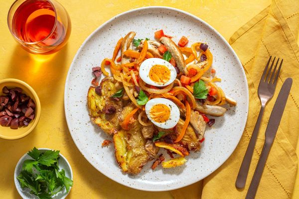 Sausages with smashed potatoes and warm Tunisian mechouia salad