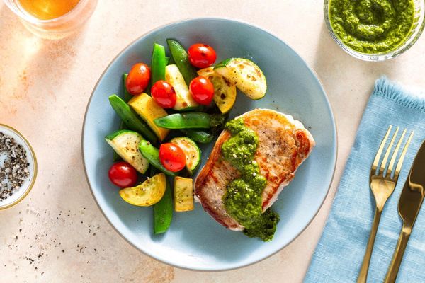 Seared salmon with chimichurri and Provençal vegetables