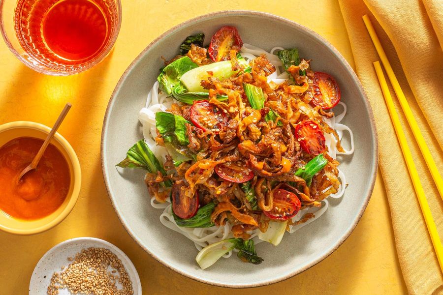 Spicy yuba stir-fry with flat rice noodles, tomatoes, and bok choy