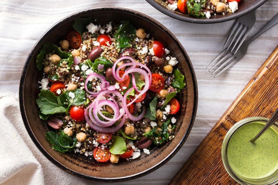 Quinoa and chickpea pilaf with kale and tahini goddess dressing