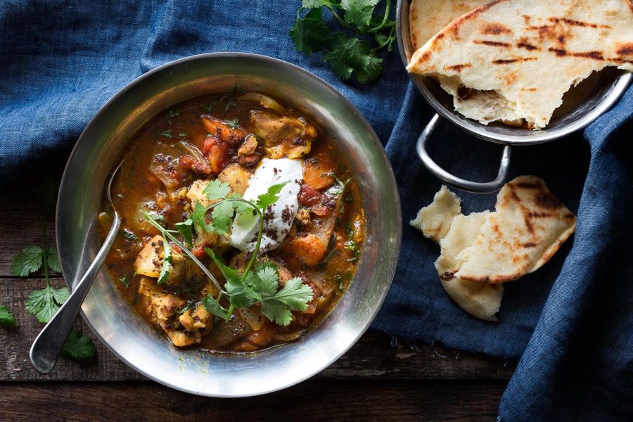 Chicken garam masala with yogurt and toasted naan