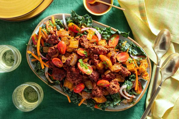 Kale taco salad with ground beef, potatoes, and honey-lime vinaigrette