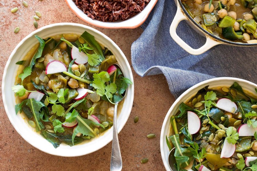 Chickpea and tomatillo stew with wilted dandelion greens