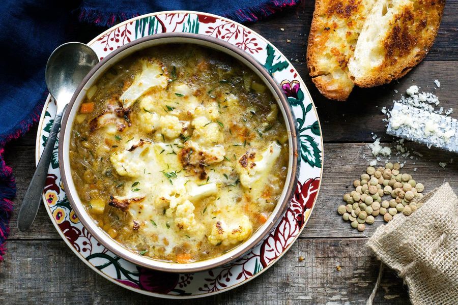 Lentil and cauliflower soup with Swiss cheese and toasted crostini