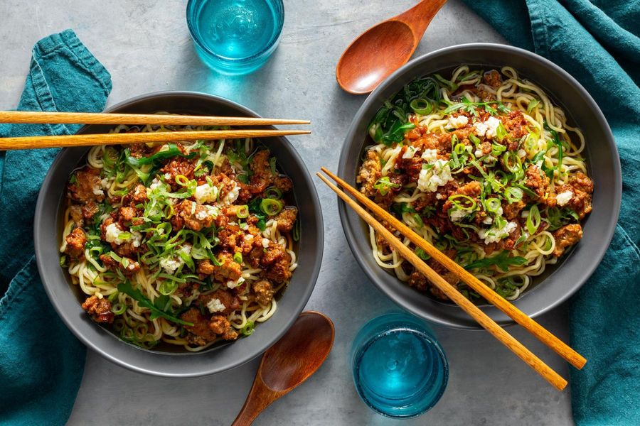 Taiwanese noodle soup with ground pork and baby greens