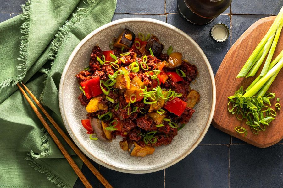 Five-spice stir-fry with eggplant and cashew-plum sauce