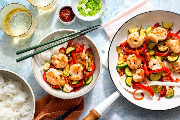 Hanoi steak stir-fry with zucchini and bell pepper over steamed rice