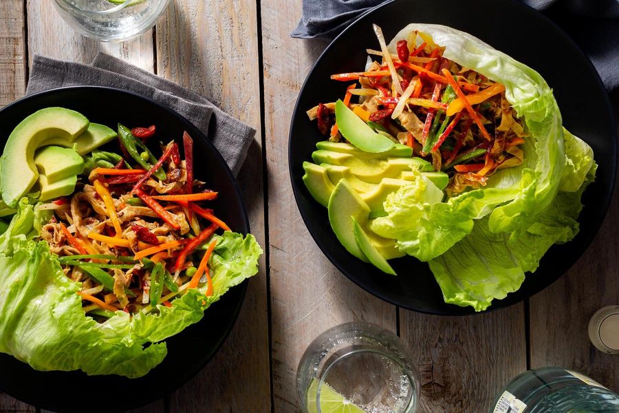 Yuba lettuce cups with avocado, snap peas, and goji berries