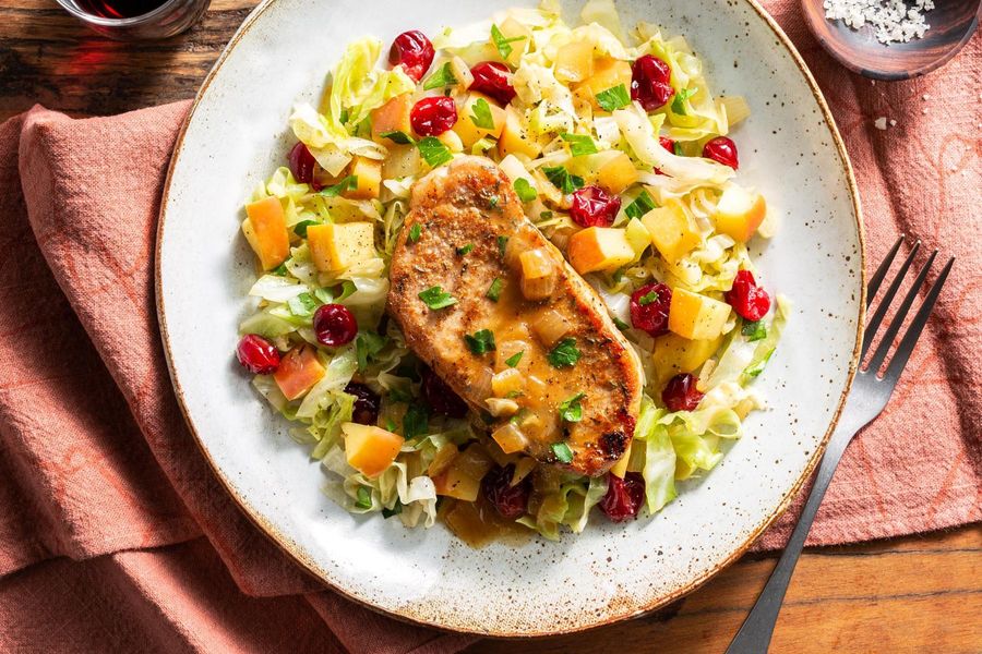 Spiced pork chops with braised cabbage, apple, and cranberries