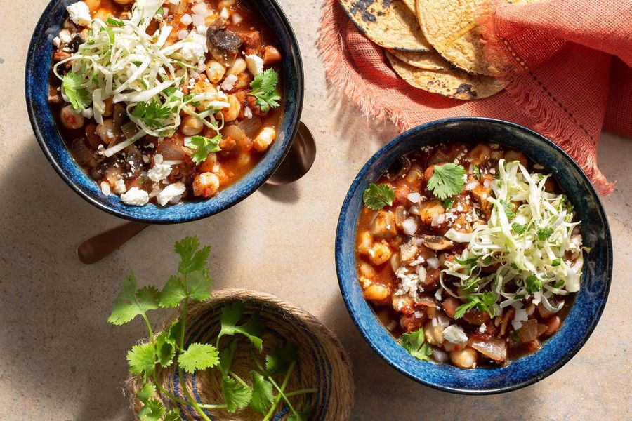 Pinto bean and hominy pozole rojo with warm tortillas
