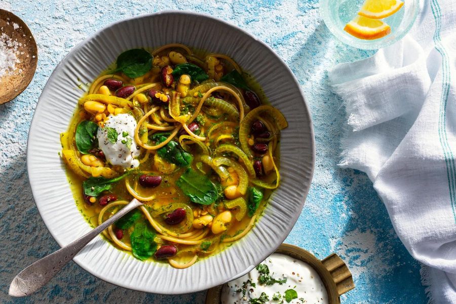 Persian new year noodle soup with mint yogurt