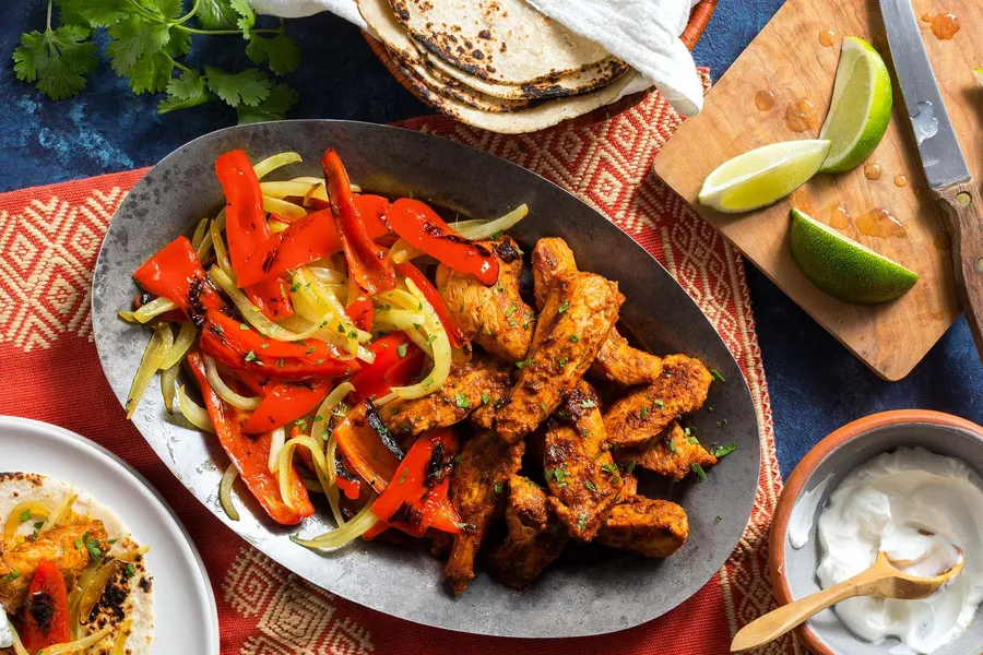 New Mexican chicken fajitas with bell pepper and onion