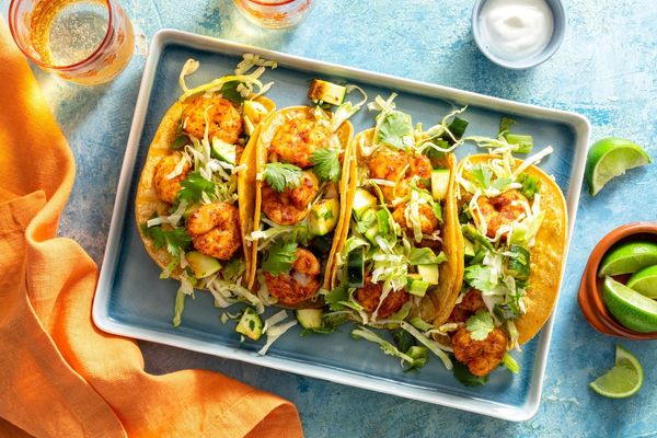 Steak tacos with zucchini-scallion salsa, cabbage slaw, and lime yogurt