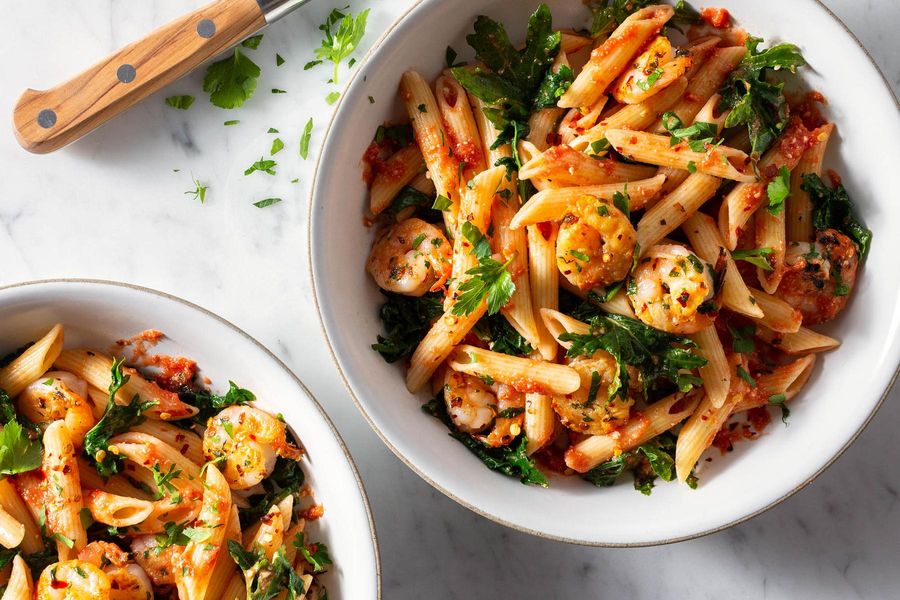 Fresh penne with shrimp, baby kale, and pesto alla trapanese