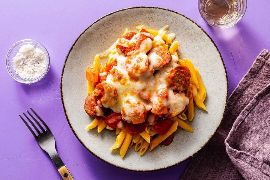 Spicy penne arrabbiata with Italian sausage and roasted bell peppers