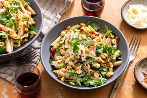 Pasta carbonara with arugula, hazelnuts, and pecorino