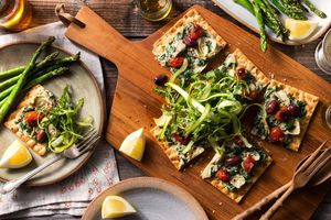 Spinach-artichoke flatbreads with shaved asparagus salad