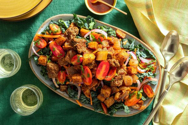 Kale taco salad with ground beef, potatoes, and honey-lime vinaigrette