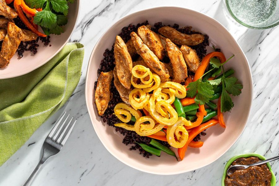 Tamarind chicken over black rice with bell pepper and egg ribbons