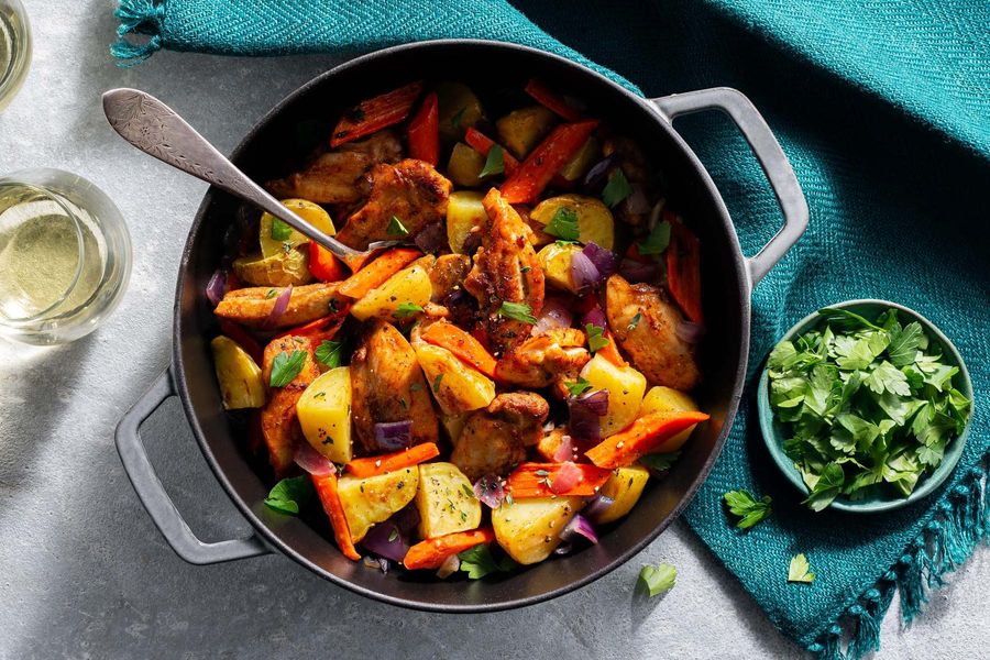 Braised chicken with carrots, potatoes, and thyme