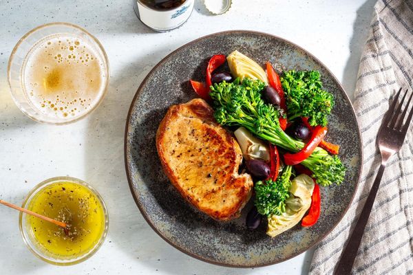 Mediterranean lemon chicken with baby broccoli, artichokes, and olives