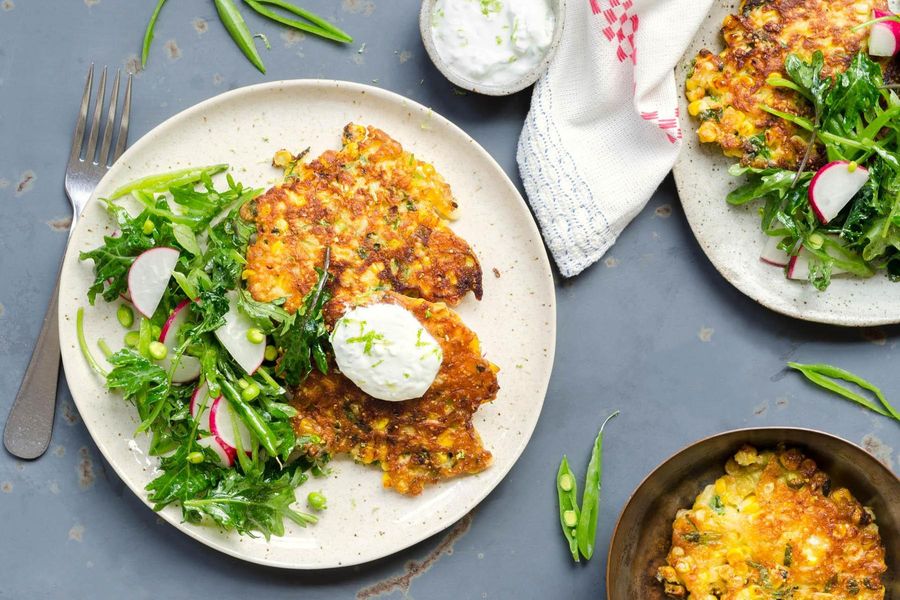 Corn fritters with snap pea salad