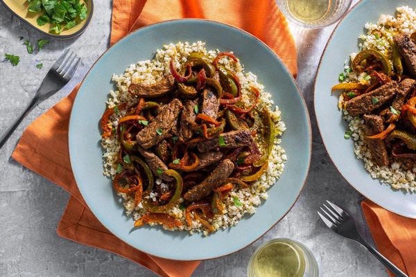 Puerto Rican steak and onions over cauliflower 
