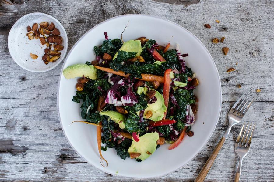 Kale salad with lemon-miso vinaigrette and toasted almonds