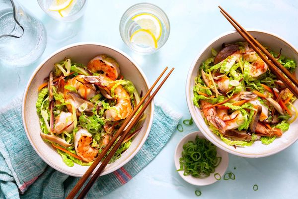 Pork egg roll in a bowl with stir-fried vegetables