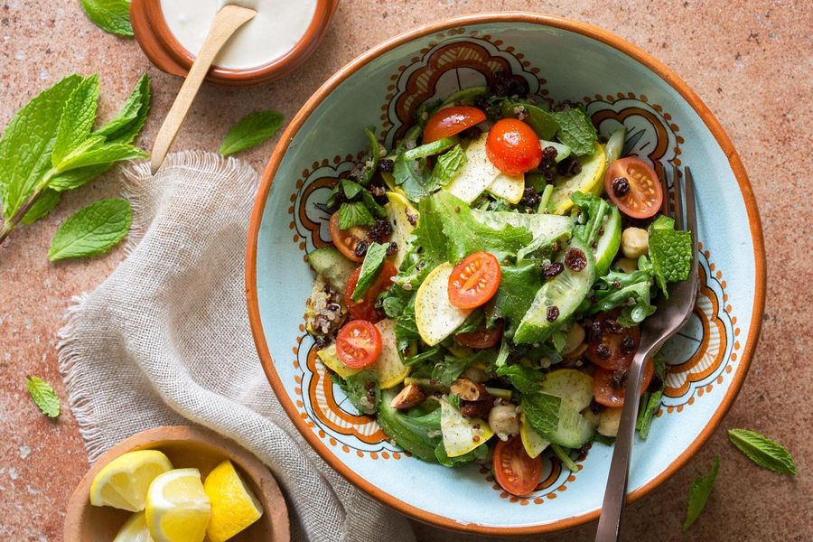 Quinoa-chickpea salad with tomatoes and lemon-tahini dressing